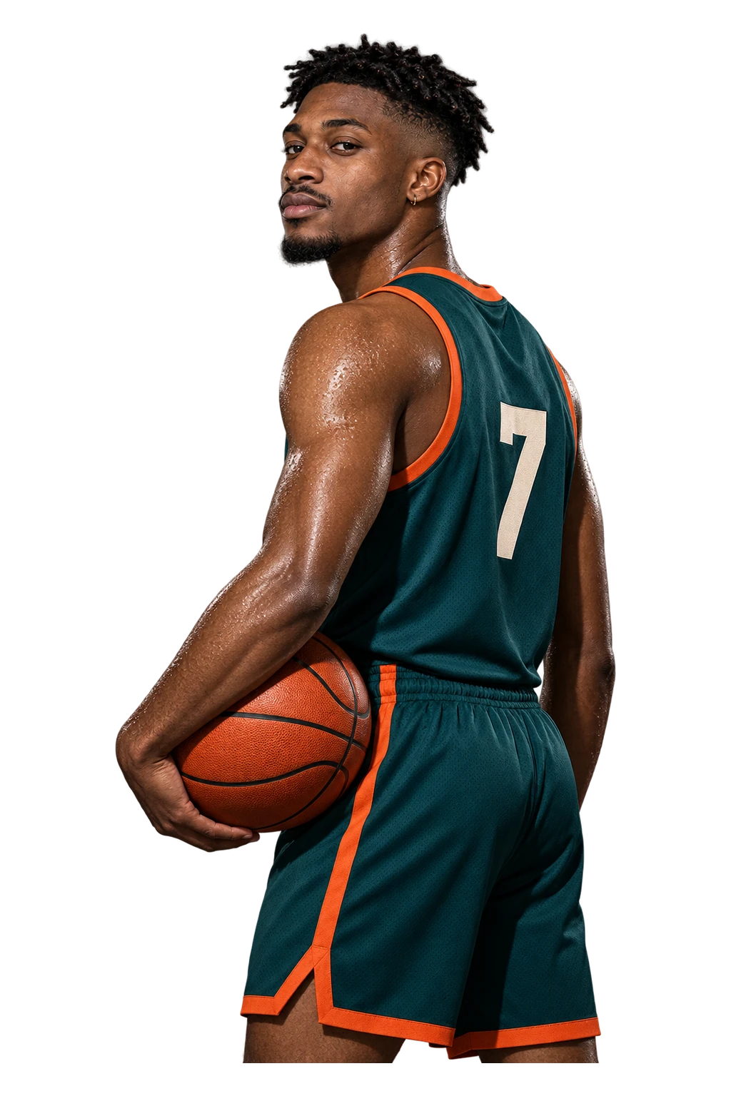 Kai in the team kit, a ball on his hip, looking back over his shoulder