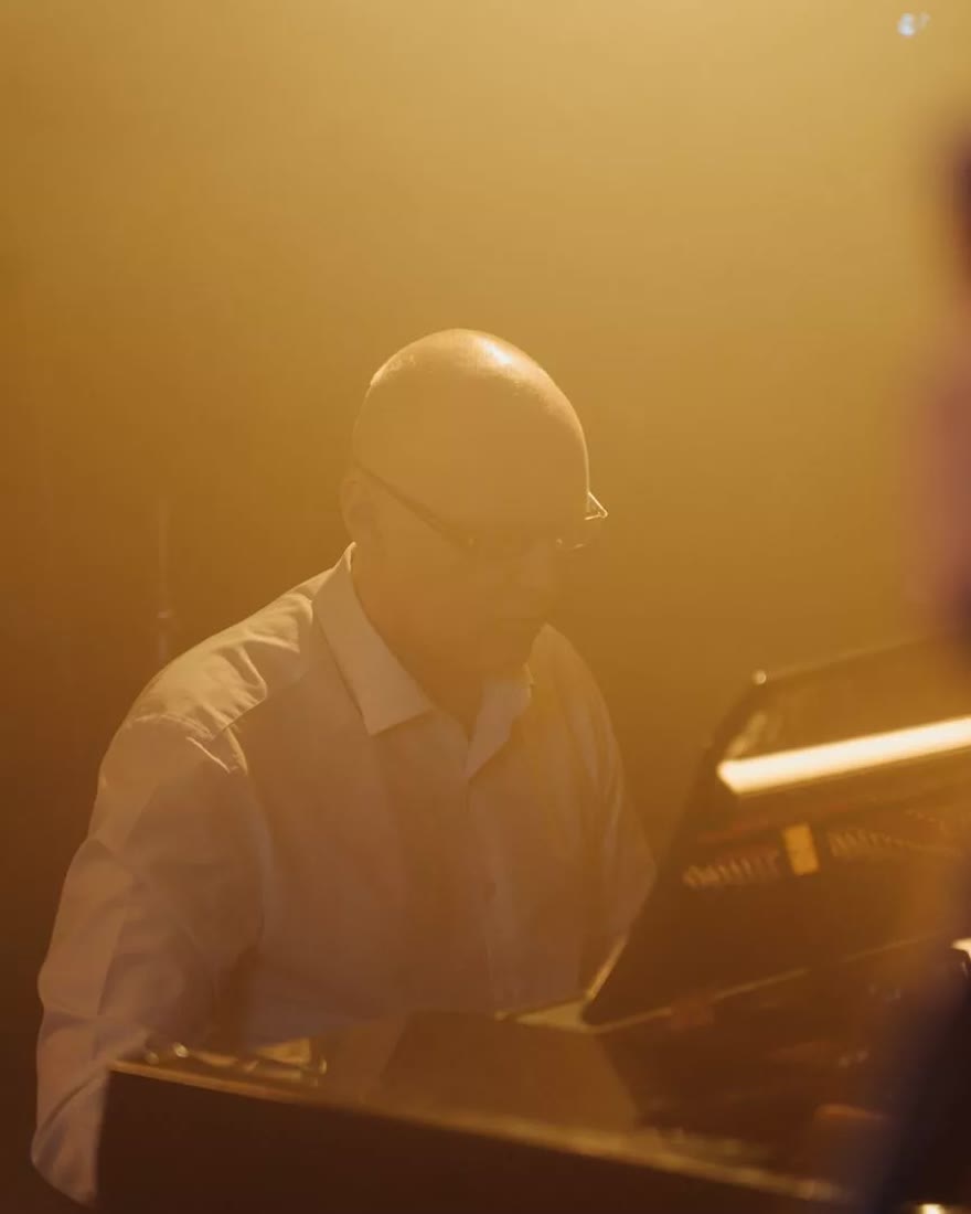 Len Ashby at the piano