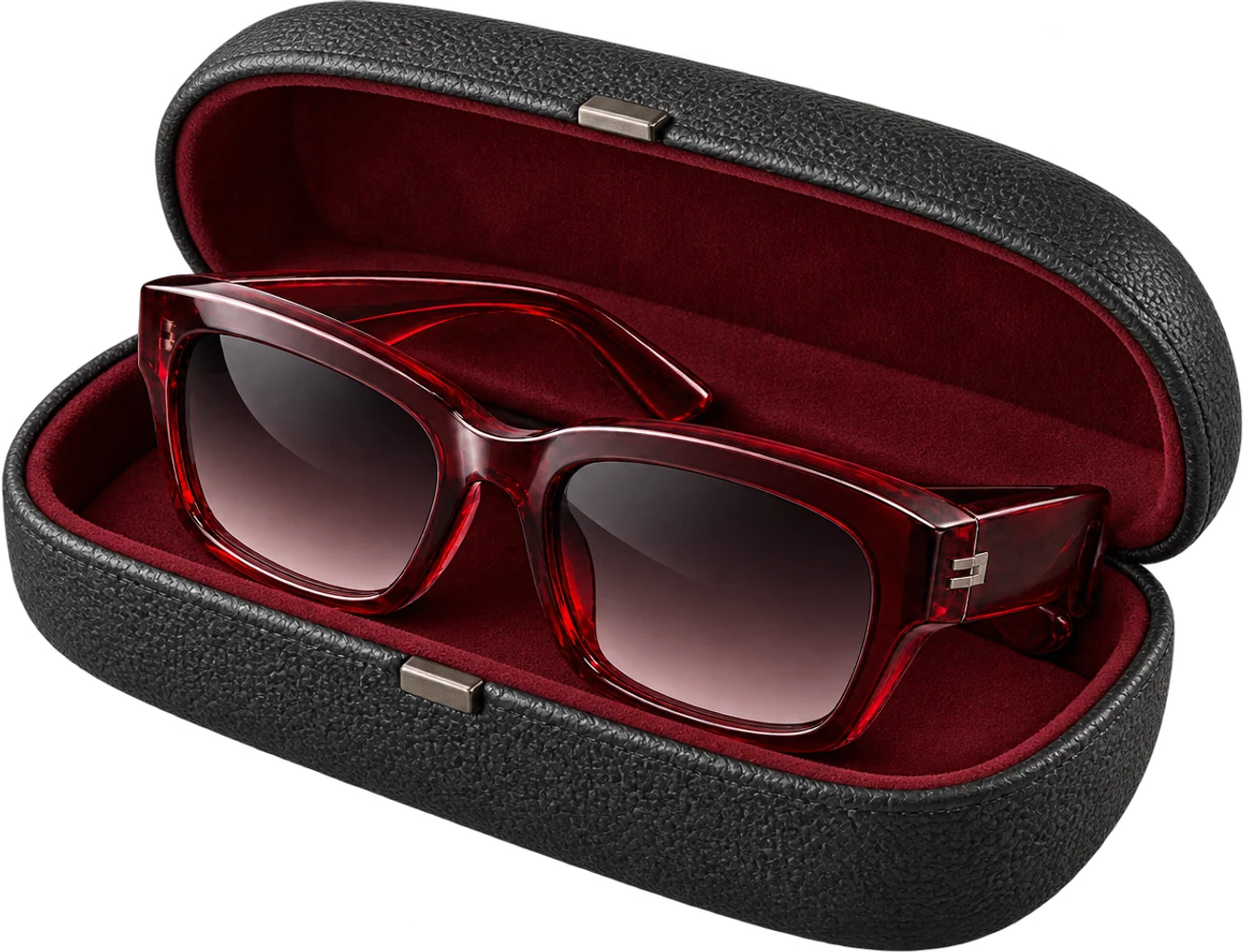Afterlight sunglasses resting in their open protective case: black pebbled leather outside, oxblood suede inside.
